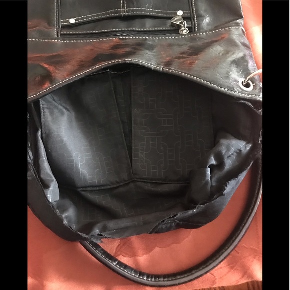 EUC Black Rossetti Bucket Bag. Silver Hardware. Full of zippers and pockets. - Picture 6 of 6